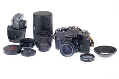 Lot 58 - A Fujica ST801 SLR Camera Outfit