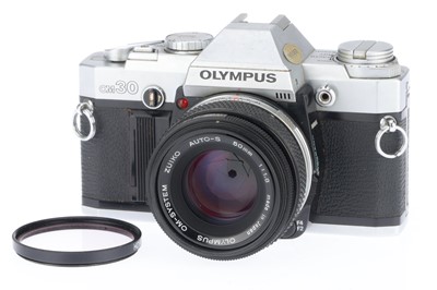 Lot 103 - An Olympus OM30 35mm SLR Camera