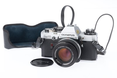 Lot 104 - An Olympus OM10 35mm SLR Camera