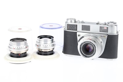 Lot 73 - A Kodak Retina IIIS 35mm Rangefinder Three Lens Camera Outfit