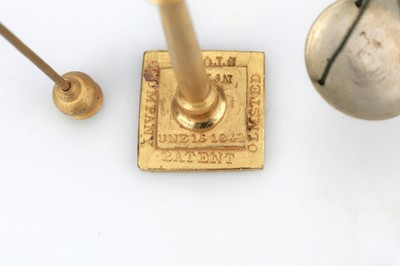 Lot 373 - A gilt brass Olmsted Patent Stove Company Pocket Sovereign Scale