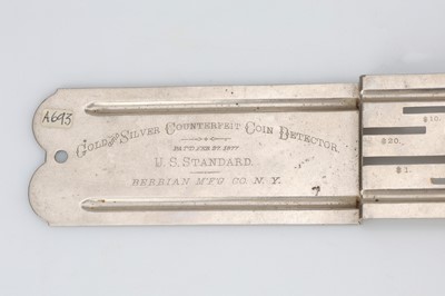 Lot 399 - A nickel-plated brass Berrian Mfg Gold and Silver Counterfeit Coin Detector Rocker