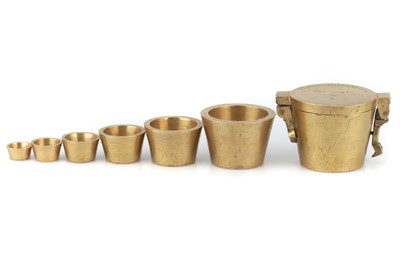 Lot 339 - A nest of six brass cup weights to weigh Stones