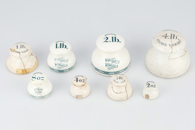 Lot 317 - A group of white ceramic lead-weighted Imperial Grocers' Weights