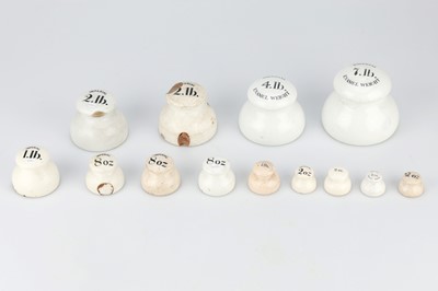 Lot 316 - A group of white ceramic lead-weighted Imperial Grocers' Weights