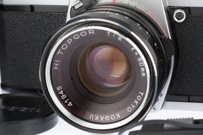 Lot 137 - A Pair of Topcon 35mm Camera Outfits