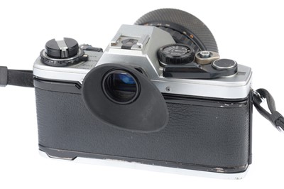 Lot 189 - An Olympus OM-10 35mm Camera Outfit