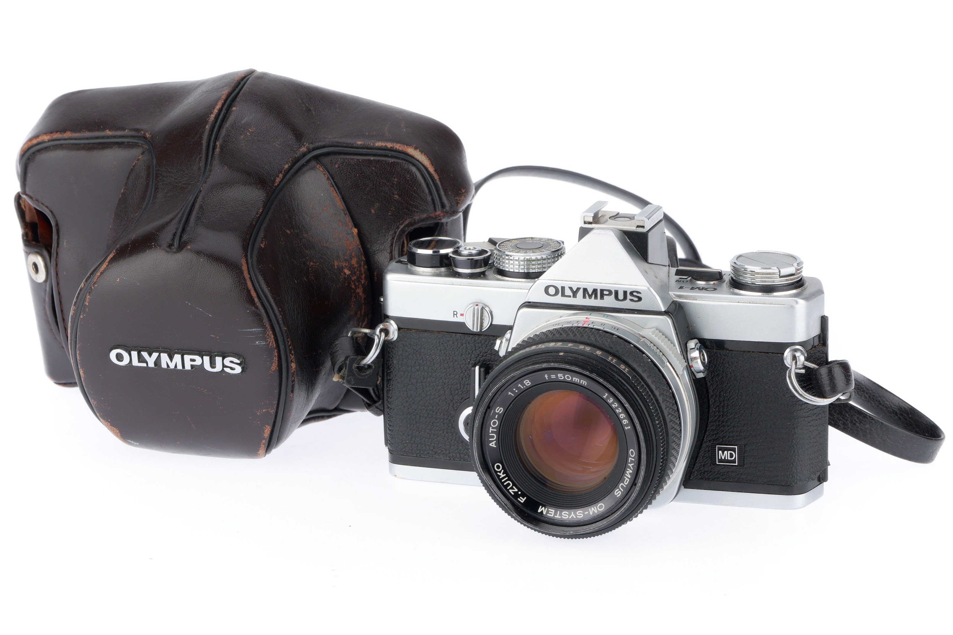 Lot 214 - An Olympus OM-1 SLR Camera,