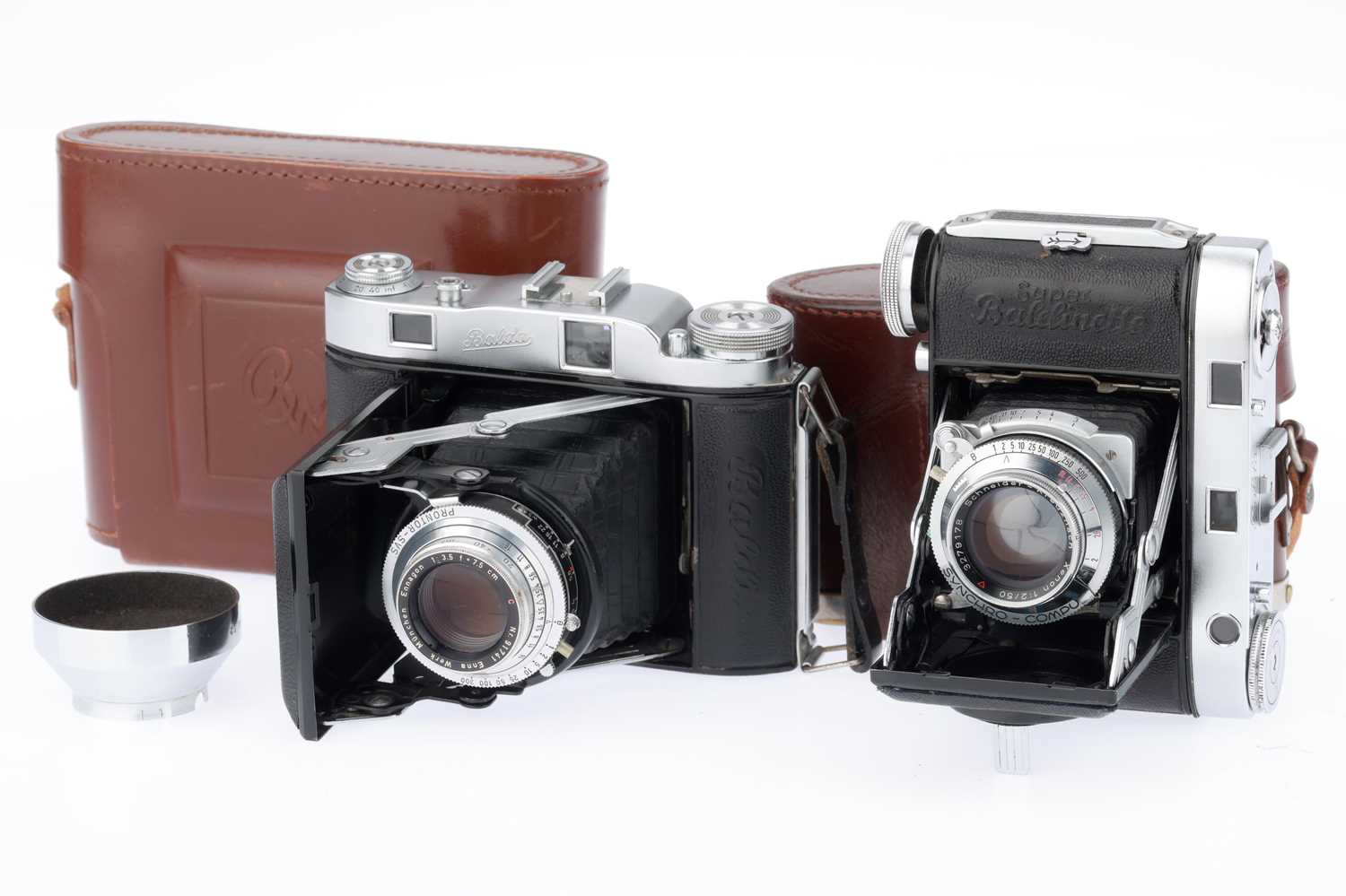 Lot 225 - A Pair of Balda Folding Cameras,