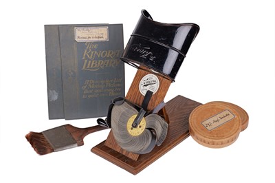 Lot 271 - A Kinora Viewer & Film, Magic Umbrella