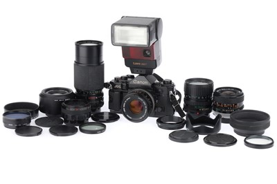 Lot 106 - A Canon A-1 35mm SLR Camera Outfit