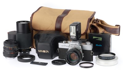 Lot 194 - A Minolta SRT303 SLR Camera Outfit