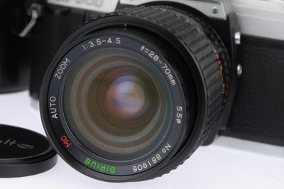 Lot 32 - A Minolta X-300 35mm Camera Outfit