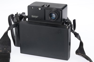 Lot 302 - A Polaroid 600SE Instant Film Camera