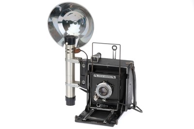 Lot 175 - A Graflex Speed Graphic Folding Press Camera and Flash