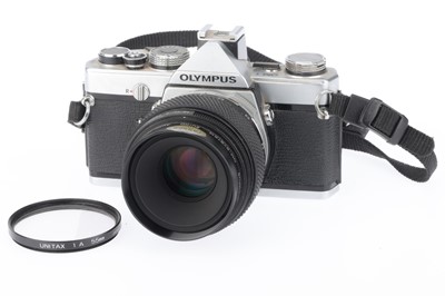 Lot 104 - An Olympus OM-1 35mm SLR Camera
