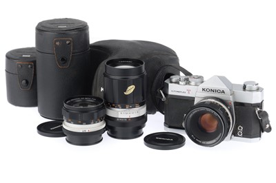Lot 33 - A Konica Autoflex T 35mm SLR Camera Outfit
