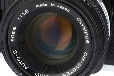 Lot 114 - An Olympus OM-10 35mm SLR Camera
