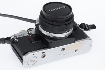 Lot 114 - An Olympus OM-10 35mm SLR Camera