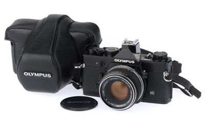Lot 115 - An Olympus OM-1N 35mm SLR Camera