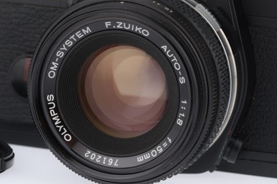 Lot 118 - An Olympus OM-2 Spot/Program 35mm SLR Camera
