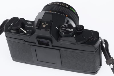 Lot 118 - An Olympus OM-2 Spot/Program 35mm SLR Camera