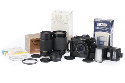 Lot 19 - A Nikon EM Camera Outfit