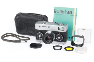 Lot 204 - A Rollei 35 Compact 35mm Camera and Accessories
