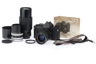 Lot 235 - A Canon F-1 New 35mm SLR Camera Outfit