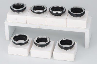 Lot 614 - A Collection of Lens Adapters