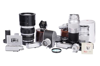 Lot 100 - A Selection of Leitz Lenses & Accessories for Leica Cameras