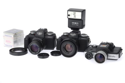 Lot 354 - A Group of Minolta 110 SLR Cameras