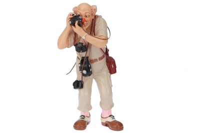 Lot 796 - A Porcelain Statue of a Photographer Clown