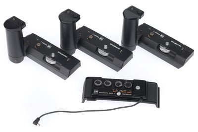 Lot 129 - A Group of Olympus Motor Drives and a Data Back