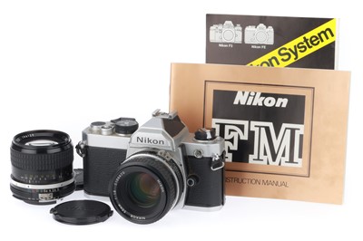 Lot 24 - A Nikon FM 35mm SLR Camera Outfit