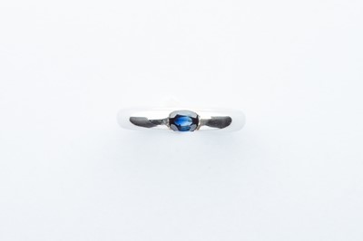 Lot 7 - A Cartier 18ct White Gold & Blue Oval Sapphire Ring