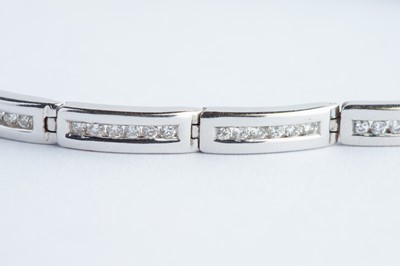 Lot 15 - A 9ct Yellow Gold Rhodium Plated Diamond Line Braclet