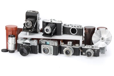 Lot 323 - A Selection of Cameras and Lenses