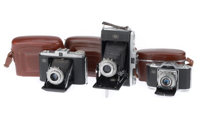 Lot 275 - comprising a Zeiss Ikon Ikonta 522/24, black,...