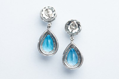 Lot 21 - A Pair of 14ct White Gold Blue Topaz & Diamond Drop Earrings