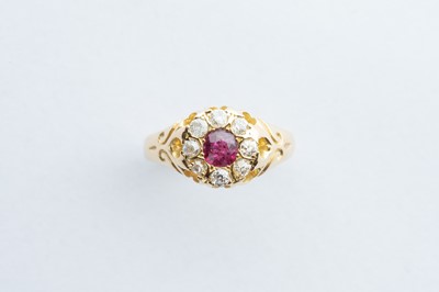 Lot 25 - A 18ct Yellow Gold Ruby & Diamond Cluster Ring