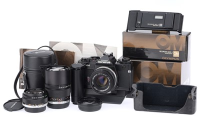 Lot 258 - An Olympus OM-4 35mm SLR Camera Outfit