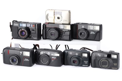 Lot 127 - A Group of Nikon, Pentax and Canon Compact 35mm Cameras