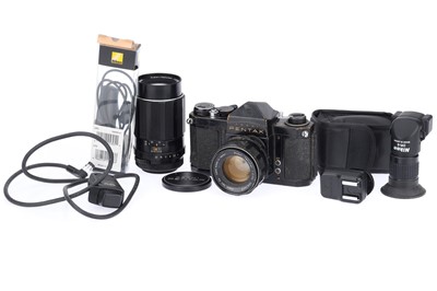 Lot 284 - An Asahi Pentax S1a 35mm SLR Camera and Nikon accessories