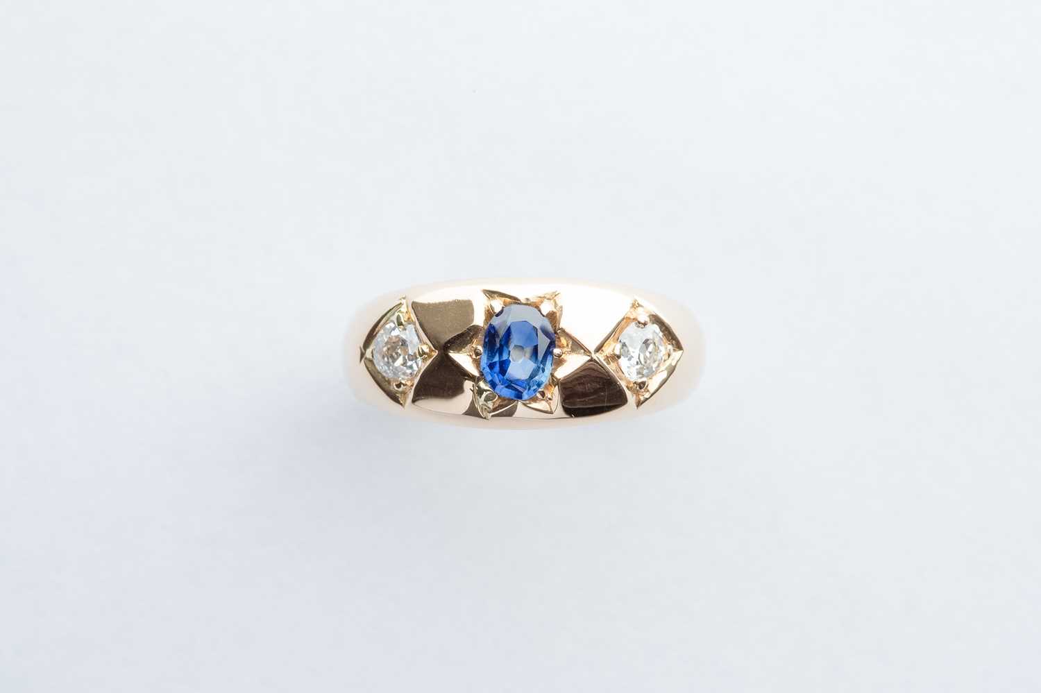 Lot 43 - A Gold Diamond & Saphire Ring