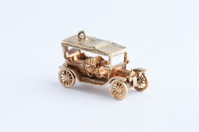 Lot 60 - A 9ct Gold Car Charm