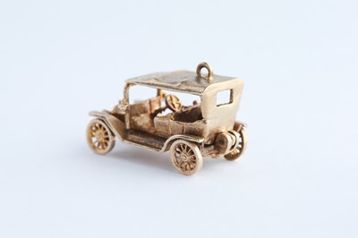 Lot 60 - A 9ct Gold Car Charm