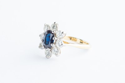 Lot 64 - A Gold Sapphire & Diamond Daisy Cluster Ring