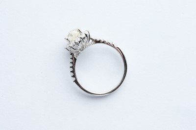 Lot 68 - A 18ct White Gold Diamond Halo Ring
