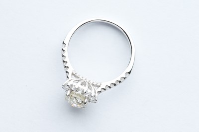 Lot 68 - A 18ct White Gold Diamond Halo Ring